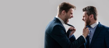 Man face portrait, banner with copy space. colleagues have disagreement and conflict. businessmen face to face. disrespect and contradiction