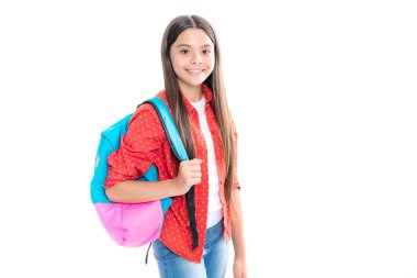 Back to school. Teenager schoolgirl in school uniform with bagpack. School children on isolated studio white background. Portrait of happy smiling teenage child girl
