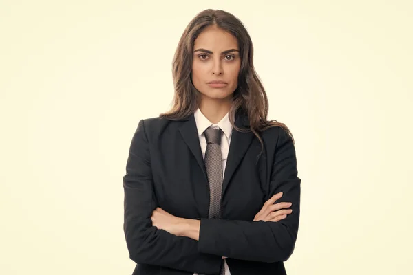 Portrait of business woman in suit crossed arms. Confidence businesswoman against grey background with copy space. Proud student girl. Beautiful businesswoman