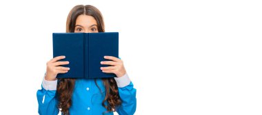 School kid hide face with book isolated on white, library. Horizontal isolated poster of school girl student. Banner header portrait of schoolgirl copy space