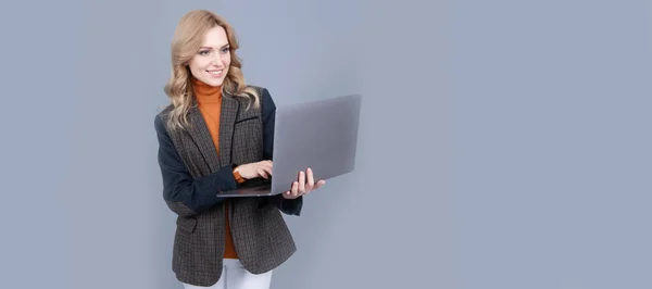 Woman journalist use laptop computer for writing online, technology. Woman portrait, isolated header banner with copy space