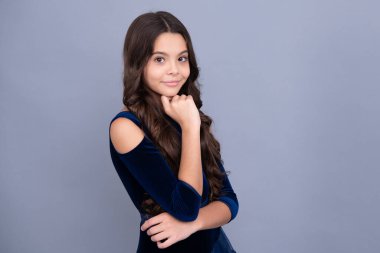 Happy face, positive and smiling emotions of teenager girl. Cute preteen girl head shot. Child portrait on isolated background. Beautiful teenager face