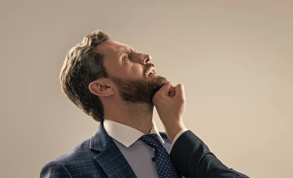 Professional man lawyer got punch in face with fist grey background, defeat.