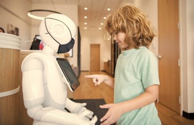 little boy interact with robot artificial intelligence, communication.
