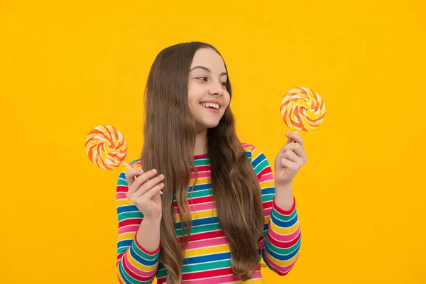 Teen Girl Hold Lollipop Caramel Yellow Background Candy Shop Teenager — Stockfoto