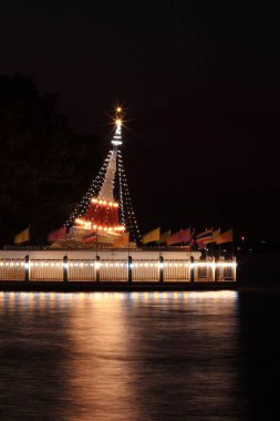 Sun rises in the palm of the field in the morning
