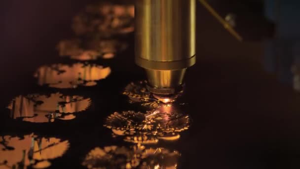 CNC laser cutting machine working with sheet metal with sparks — Stockvideo