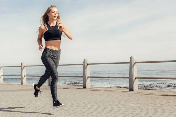 Full Length Sporty Caucasian Young Woman Jogging Promenade Sea Sky — Fotografia de Stock