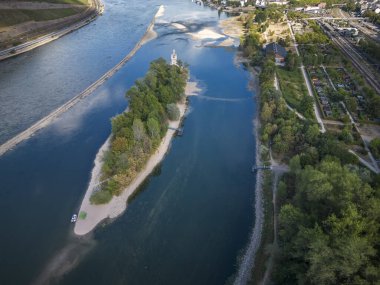 Aerial view with the Rhine and Mouse Tower Island near Bingen in Rhineland-Palatinate in Germany. Extreme low water in the drought summer of 2022. 