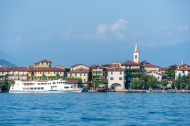 View over Lake Maggiore to Isola dei Pescatori by Stresa. Stresa is a town in Piedmont in northern Italy