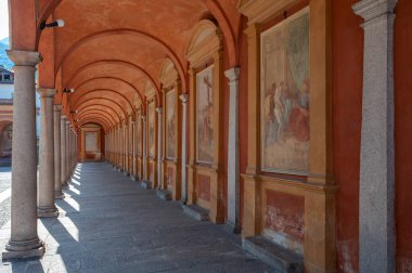 Cloister of the Church of SS Gervasio and Protasio in Baveno. Baveno is a town in Piedmont in northern Italy