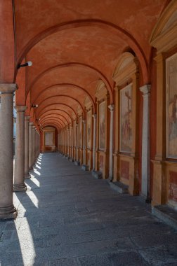 Cloister of the Church of SS Gervasio and Protasio in Baveno. Baveno is a town in Piedmont in northern Italy