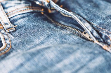 Kotun fermuarını aç. Kot pantolon dokusu arka planı