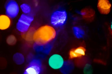 Sarı ve mavi renkli dairesel ışıkların soyut arkaplanı