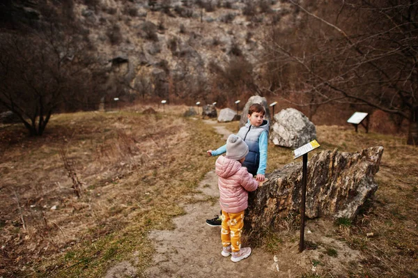 Kids at Turold science trail, Mikulov, Czech Republic learn types of rock breeds.