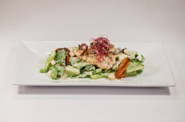 View on white background of salad with meat. Healthy food, diet lunch concept. 