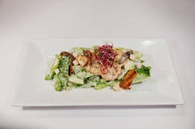 View on white background of salad with meat. Healthy food, diet lunch concept. 