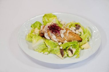 View on white background of salad with meat. Healthy food, diet lunch concept. 