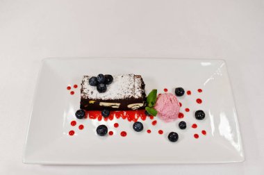 View on white background of cake with ice cream. Healthy food, diet lunch concept. 