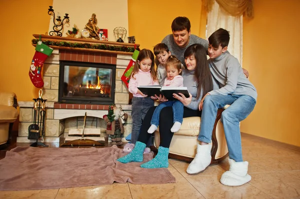 Happy Young Large Family Fireplace Warm Living Room Winter Day — стоковое фото