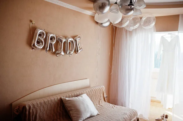 Decor for the bride's morning. Decorated balloons.