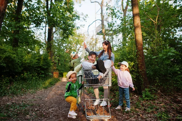 Mother Kids Trolley Having Fun Forest — Zdjęcie stockowe