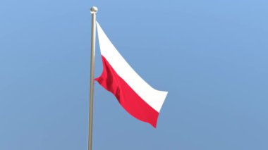 Bayrak direğinde Polonya bayrağı. Polonya bayrağı rüzgarda dalgalanıyor.