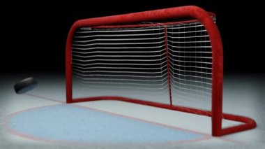 Hokey golü. Disk buz pistindeki kaleye doğru uçuyor. Bahis terfisi için uygun spor konsepti.