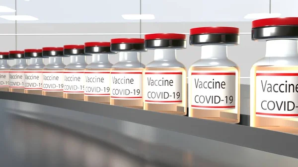 Vaccine production. Many Covid-19 vaccine vials in production. Factory. Vaccination.