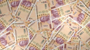 200 Indian rupees money composition. Financial background. Many banknotes and wads of money. Business or economy concept. Cash.