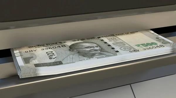 500 Indian rupees in cash dispenser. Withdrawal of cash from an ATM. Financial transaction in the bank terminal. INR.