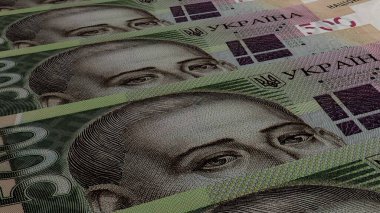 500 Ukrainian hryvnia money composition. Financial background. Many banknotes and wads of money. Business or economy concept. Cash.