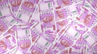 2000 Indian rupees money composition. Financial background. Many banknotes and wads of money. Business or economy concept. Cash.