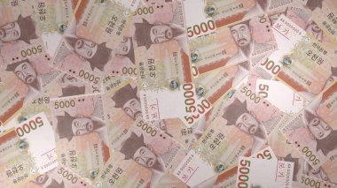 5000 South Korean won money composition. Financial background. Many banknotes and wads of money. Business or economy concept. Cash.
