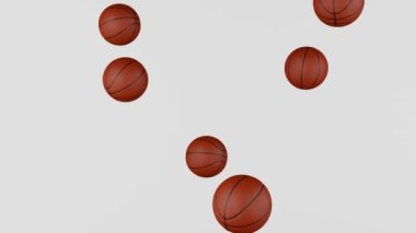 Many classic Basketball balls falling down on white background. Sport concept.