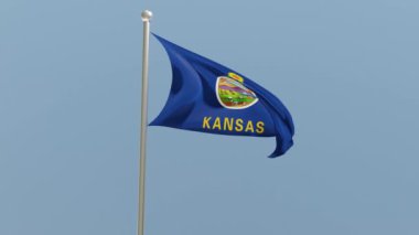 Kansas flag on flagpole. KS flag fluttering in the wind. USA. National flag.