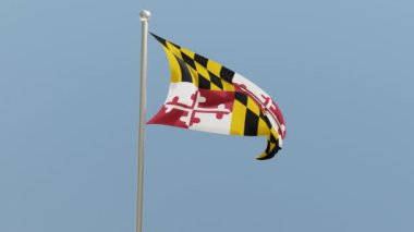 Maryland flag on flagpole. MD flag fluttering in the wind. USA. National flag.