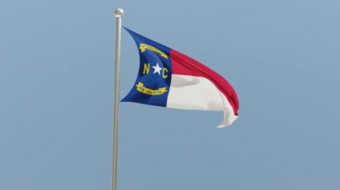 North Carolina flag on flagpole. NC flag fluttering in the wind. USA. National flag.