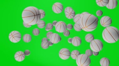 Basketball balls fly into the camera on chromakey background. Green screen. Creative sports footage suitable for sport events or betting promotion.