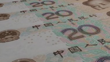20 Chinese yuan money composition. Financial background. Many banknotes and wads of money. Business or economy concept. Cash.