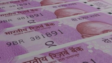 2000 Indian rupees money composition. Financial background. Many banknotes and wads of money. Business or economy concept. Cash.