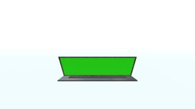 Yeşil ekran görüntülü gri laptop. Reklam için yeri olan bir defter. Kişisel bilgisayarın ekranında Chromakey alanı.