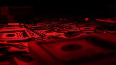 Criminal concept. Wads of money and weapon bullets. Background.