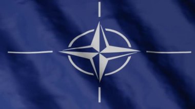 Nato army flag. Military organization flag fluttering in the wind. Europe.