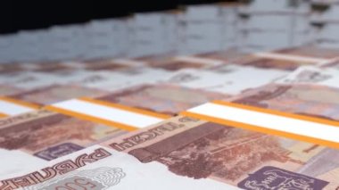 5000 Russian rubles money composition. Financial background. Many banknotes and wads of money. Business or economy concept. Cash.