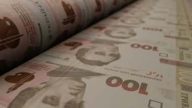 100 Ukrainian hryvnia bills on money printing machine. Video of printing cash. Banknotes. UAH. Economy.