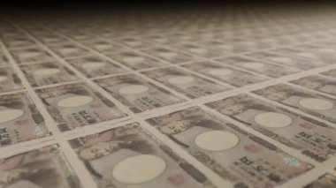 Para basma makinesinde 10000 Japon Yen fatura. Para basma videosu. Banknotlar.