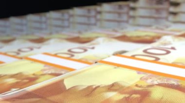 100 Israeli shekels money composition. Financial background. Many banknotes and wads of money. Business or economy concept. Cash.