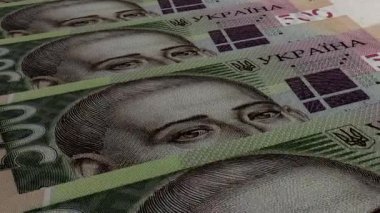500 Ukrainian hryvnia money composition. Financial background. Many banknotes and wads of money. Business or economy concept. Cash.