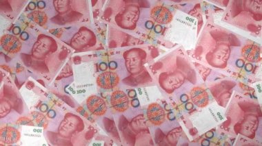 100 Chinese yuan money composition. Financial background. Many banknotes and wads of money. Business or economy concept. Cash.